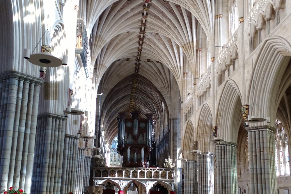 Interior of Exeter Cathedral showing the nave and vaulted ceiling